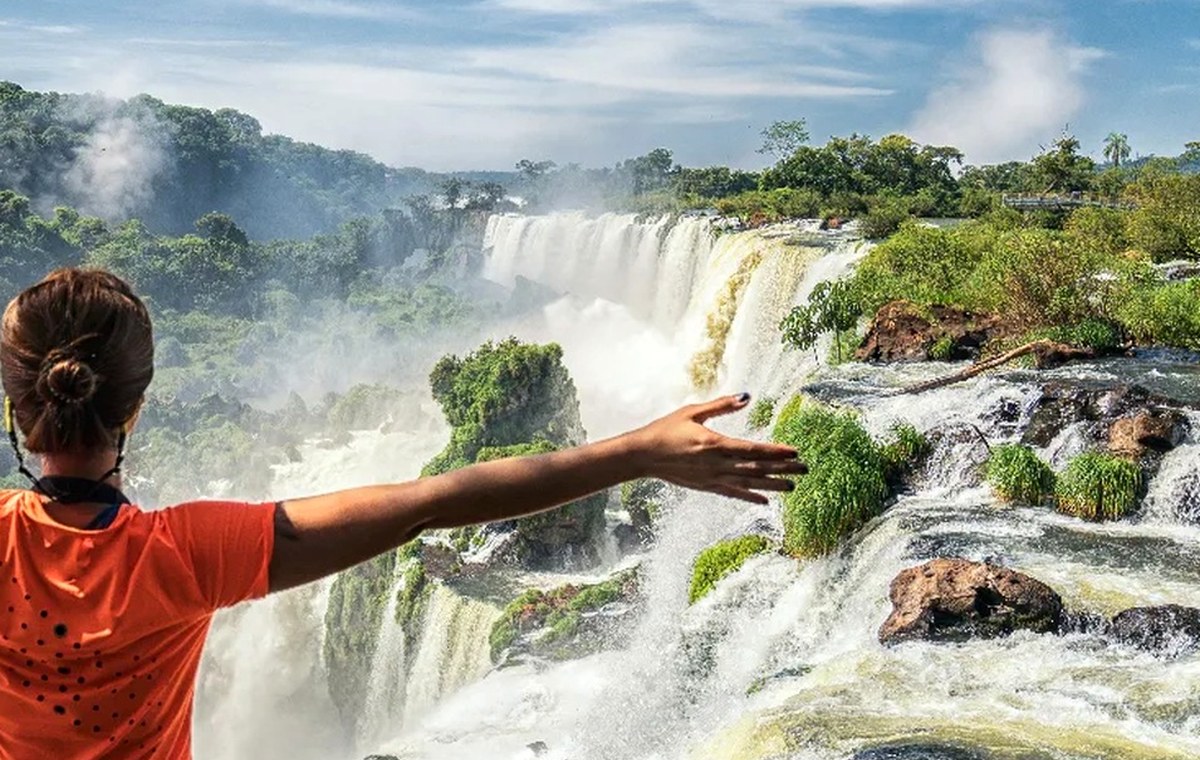 Waterfalls, mist and green landscape